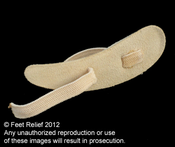 Pedifix suede genuine leather hammer toe crest pad bottom side highlighting the adjustable elastic strap