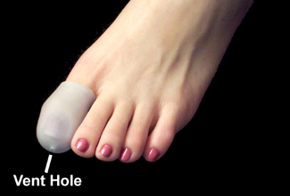 pedifix gel toe cap on big toe showing small vent hole at tip of cap