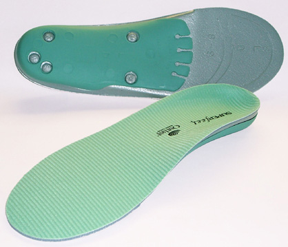 Superfeet Wintergreen footbeds, one face up and one face down