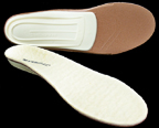 superfeet wooly white arch support insoles pair with one on side showing the plastic arch support shell and one face up showing the merino wool top cover